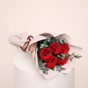 A Classy Creation Of Red Roses